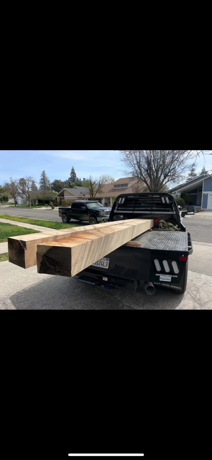 Large timber beam loaded on a truck bed