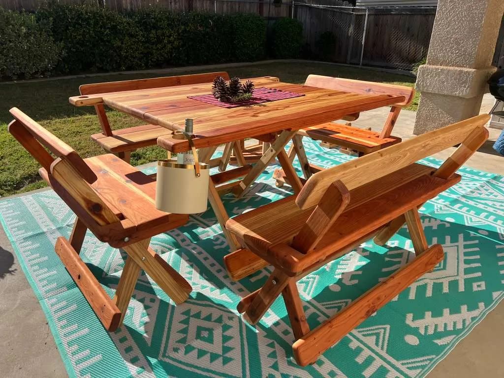 Michael Frazier redwood table with benches opened for outdoor dining